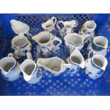 A collection of reproduction Royal Worcester blue and white jugs, with certificates