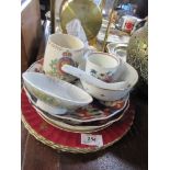 A collection of porcelain to include Royal Worcester plates, an Oriental shallow bowl on a