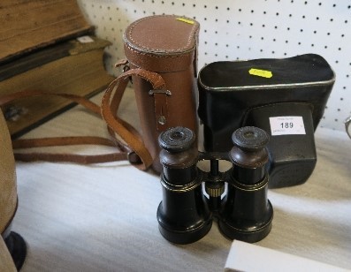 A pair of Voigtlender & Sohn binoculars, and a Zenit camera