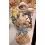Three Royal Worcester figures, Saturday's Child, Friday's Chid and another - Fridays in good