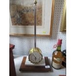 A T.W. Bazeley limited edition rack clock, with brass cased drum movement on a brass pole, height