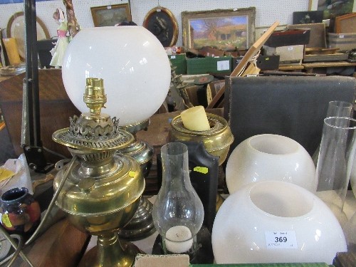 Three oil lamps and another