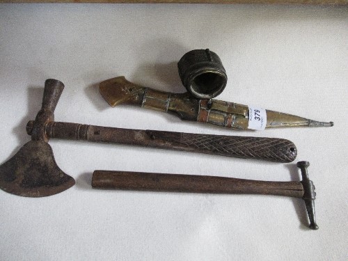 An Eastern dagger with horn handle and brass scabbard, an axe and two other items