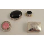 Four small Continental white metal pill boxes, one with pink enamel, two set with black stones and