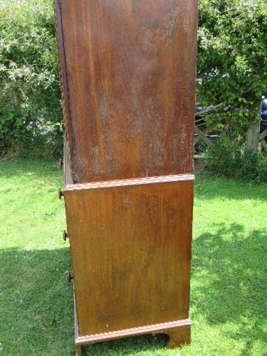 A 19th century mahogany press cupboard, having two panel doors opening to reveal three slide out - Image 3 of 6