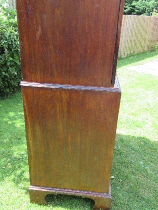 A 19th century mahogany press cupboard, having two panel doors opening to reveal three slide out - Image 5 of 6