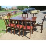 A Regency style mahogany extending dining table, reputed to have come from the Waring family of