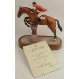 A Royal Worcester limited edition figure, Foxhunter and Lt. Col. H.M. Llewellyn C.B.E, modelled by