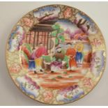 A 19th century Swansea plate, decorated with oriental figures within a landscape, having a dealer'