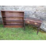 A set of three open oak bookshelves, width 42.5ins, together with an oak side table, fitted with a