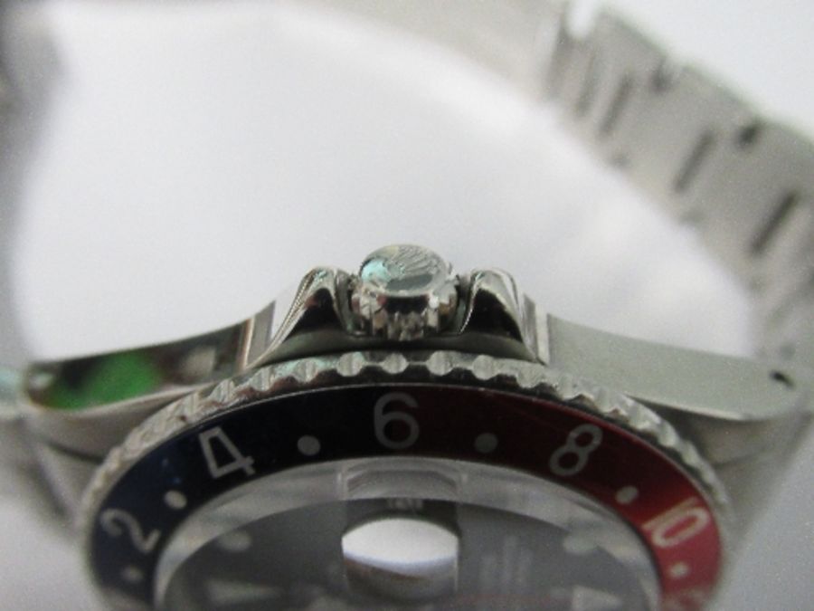 A 1970 Rolex GMT Master wristwatch, Model No. 1675, having wide "Pepsi" Bezel, and pointed crown - Image 3 of 12