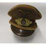 A German Third Reich style NSDAP Political Leader’s Gauleitung level visor cap, bearing label RZM