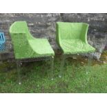 A pair of Perspex and green upholstered chairs