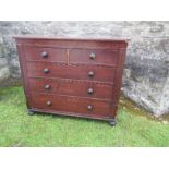 A 19th century mahogany chest, having two short and three graduated long drawers, flanked by