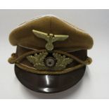 A German Third Reich style NSDAP Political Leader’s Gauleitung level visor cap, bearing RZM label,