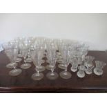 A set of 16 engraved port glasses, together with 8 large matching glasses, and 7 various thistle