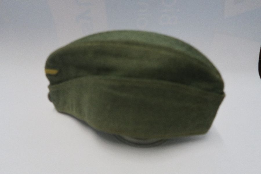 A Third Reich style M38 side hat, in grey wool fabric, having appliqued white RMBO motif to the - Image 18 of 19