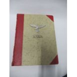 A World War 2 Luftwaffe document group, to include Third Reich style 1/611 photograph album with