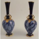 A pair of 19th century vases, with mottles blue body and gilt lugs, mark to base of one, height