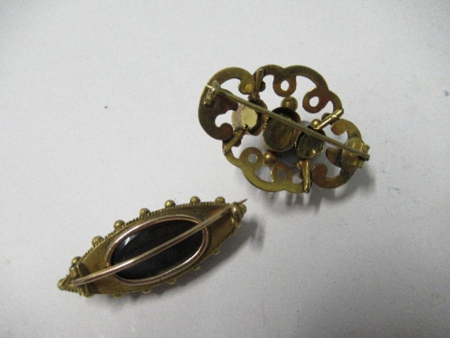 A Victorian three stone citrine brooch, of scroll work design, together with a Victorian locket back - Image 2 of 2