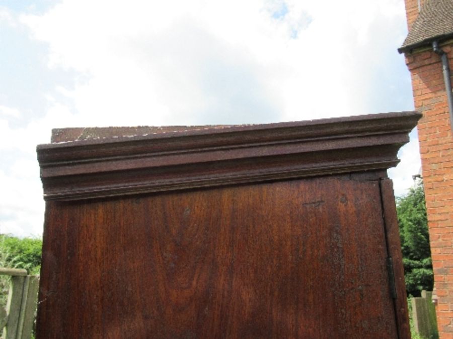 A 19th century mahogany press cupboard, having two panel doors opening to reveal three slide out - Image 6 of 6