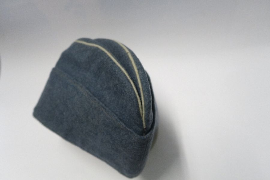 A Third Reich style M38 side hat, in grey wool fabric, having appliqued white RMBO motif to the - Image 13 of 19