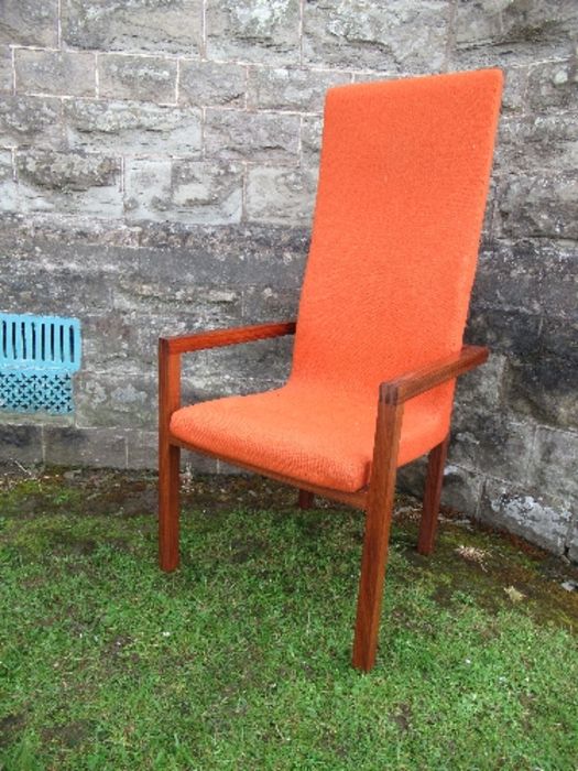 Padouk high back armchair with orange upholstery attributed to John Makepeace