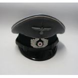 WW2 style German Officer's visor cap, bearing label Stirndrukfrei Deutsches Reichspatent