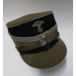 A German Third Reich style NSKK kepi, having a black body with brown woollen crown piped in silver