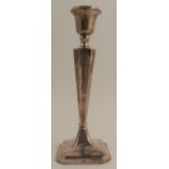 A loaded silver candle stick, Chester 1911, height 10.25ins