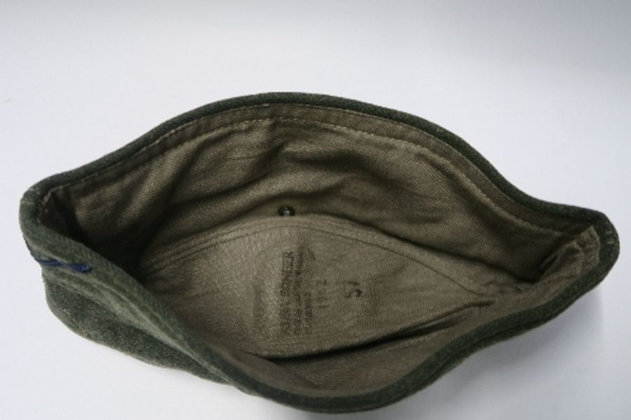 A Third Reich style M38 side hat, in grey wool fabric, having appliqued white RMBO motif to the - Image 8 of 19