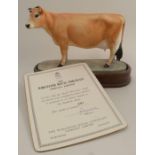 A Royal Worcester limited edition figure, Jersey Cow, modelled by Doris Lindner, with plinth and