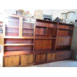 A teak, oak and rosewood bookcase unit, in the Danish style, manufactured by Sejling Skabe,