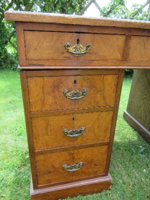 A Victorian oak and burr oak desk, fitted with one long drawer, flanked by four graduated drawers to - Image 2 of 4