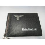 A Third Reich style photograph album, believed to have belonged to Luftwaffe pilot Willi Fleisner,