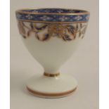 A 19th century Swansea egg cup, having a label to the base ' Swansea China Sidney Heath Collection',