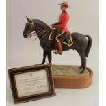 A Royal Worcester limited edition figure, Royal Canadian Mounted Policeman, modelled by Doris