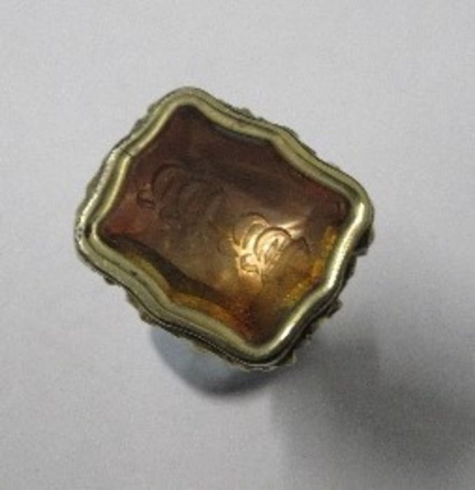 A 19th century small seal fob, the foil backed stone monogrammed - some marks, cracks to joints