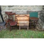 A collection of furniture to include Art and Crafts style chairs, work bench, rack, table and a card