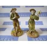 A pair of Royal Worcester shot silk figures, af - Boy's pipe broken, girls shows evidence of age