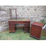 A reproduction twin pedestal desk, 48ins x 24ins x 30ins , a whatnot, repro cabinet with rising lid,