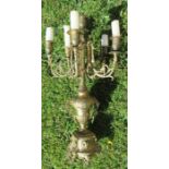 A gilt metal six light candelabrum, with scroll decoration, height 19ins