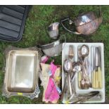 A quantity of silver plate, to include flatware, a three piece tea set and basket with swing handle