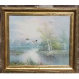 A modern oil on canvas, ducks in flight over water, 19ins x 23ins, together with a machine