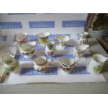 A collection of reproduction Royal Worcester jugs