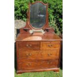 A mahogany dressing chest, with shaped mirror, over jewellery box, fitted with two short over two