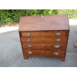 A 19th century mahogany bureau, the fall flap opening to reveal pigeonholes and drawers, over four