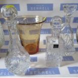 Three decanters to include a Royal Doulton example and a vase