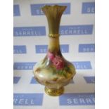 A Royal Worcester vase, decorated with roses - slight firing bubble to rim, grazes to the paint