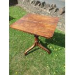 An oak tripod table, 20ins x 23ins x height 22ins